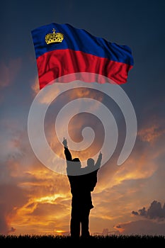 Father with son and the flag of Liechtenstein