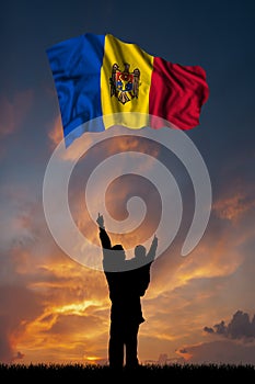 Father with son and the flag of Moldova