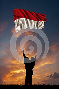 Father with son and the flag of Monaco