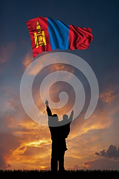 Father with son and the flag of Mongolia