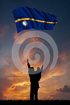 Father with son and the flag of Nauru