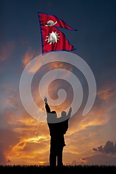 Father with son and the flag of Nepal