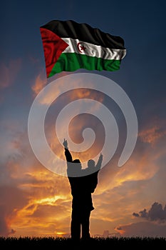 Father with son and the flag of Sahrawi Arab Democratic Republic