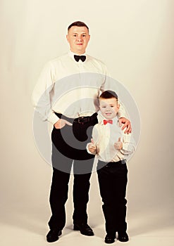 Father and son formal clothes outfit. Formal event. Grow up gentleman. Dad and boy with bow ties. Gentleman upbringing