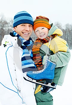 Father and son go ice skating