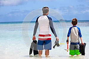 Father and son go snorkeling