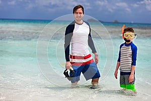 Father and son go snorkeling
