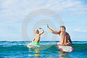 Father and Son Going Surfing