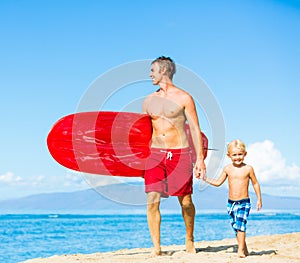 Father and Son Going Surfing