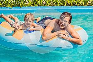 Father and son have fun at the water park