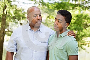 Father and son having a serious conversation.