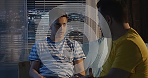 Father and son having serious conversation