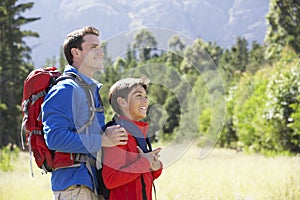 Father And Son On Hike In Beautiful Countryside