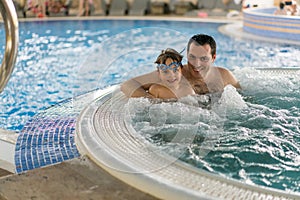 Father and son in jacuzzi