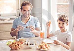 Father and son in kitchen