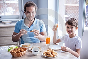 Father and son in kitchen