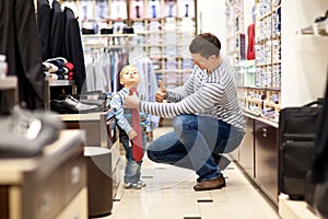 Father and son make shopping