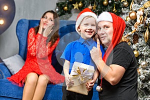 Father and son with x-mas gift box