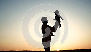 father and son in the park. father day silhouette happy family child dream concept