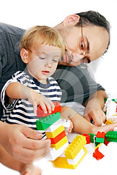 Father and son playing