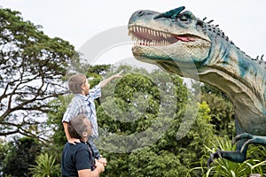 Father and son playing in the adventure dino park