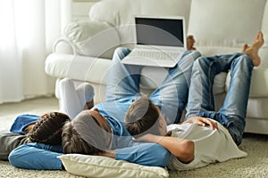 Father and son playing computer game