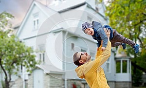 Father with son playing and having fun outdoors