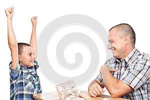 Father and son playing rummy