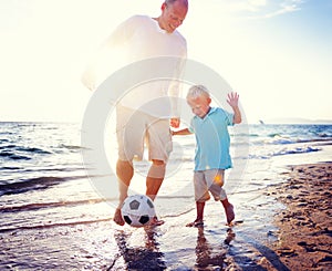 Father Son Playing Soccer Beach Summer Concept