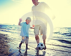 Father Son Playing Soccer Beach Summer Concept