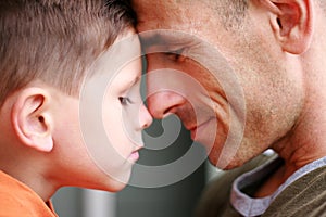 Father and son portrait smiling