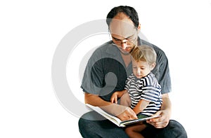 Father and son reading a book