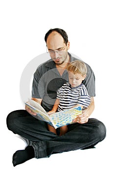 Father and son reading book