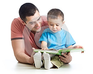 Father and son reading together