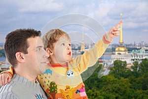 Father with son on St.Petersburg background