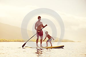 Father and Son Stand Up Paddling