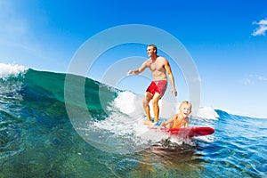 Father and Son Surfing, Riding Wave Together