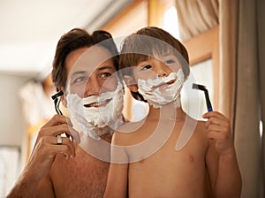 Father, son and teaching for shave, bathroom and mentor with healthy hygiene or routine. Man, child and skincare for