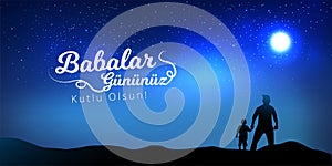 Father and son watching the night blue sky view from hands. Turkish holiday `Babalar Gunu Kutlu Olsun` Translate: `Happy Father`s