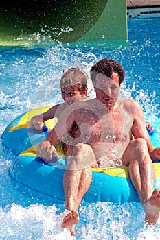 Father and son at waterpark photo