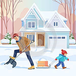 Father and son work together. Dad and boy cleans snow in the yard. Outdoor activity. Happy family. Concept Fatherhood