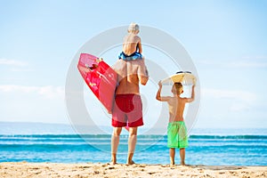 Father and Sons Going Surfing