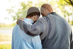 Father talking and spending time with his son.