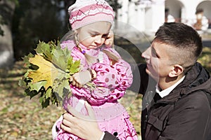 Father talking to daughter