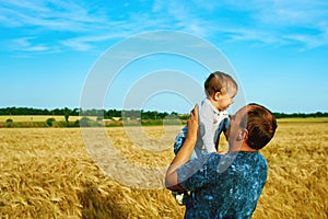 The father is talking to his daughter Happy smiling child with the parent. Family portrait.Father's day