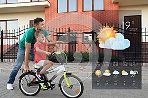 Father teaching his son to ride bicycle and weather forecast widget. Mobile application