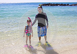 Young Family Snorkeling in the Ocean Together