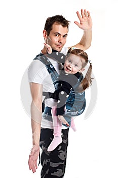 Father and toddler child in military pattern ergonomic baby carrier