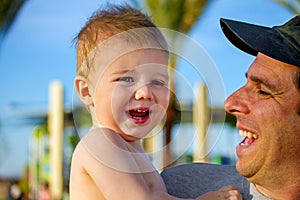 Father Tries to Cheer His Toddler Son Up