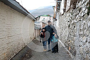 Father with two sons on street in Gurzuf